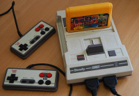 Dendy_Junior_with_cart_and_joypads.jpg 304640-0